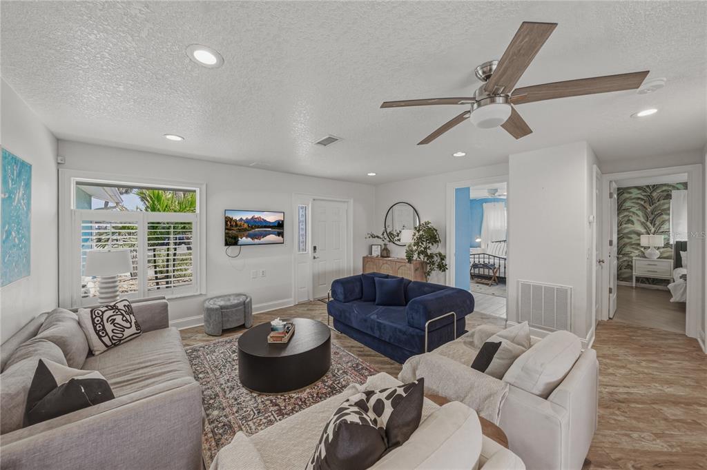 1004 Sago Palm Way Apollo Beach, FL 33572 - Photo 34 of 92 a living room with furniture and a large window