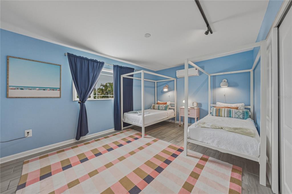 1004 Sago Palm Way Apollo Beach, FL 33572 - Photo 35 of 92 a bedroom with a bed and a window