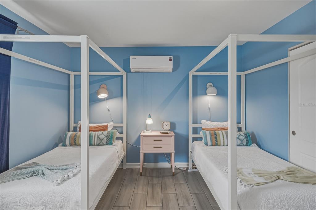 1004 Sago Palm Way Apollo Beach, FL 33572 - Photo 37 of 92 a room with a bed and a view of closet