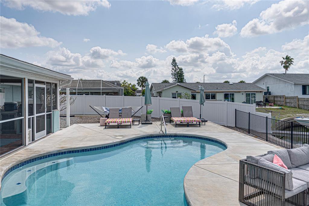 1004 Sago Palm Way Apollo Beach, FL 33572 - Photo 54 of 92 a view of a swimming pool with outdoor seating