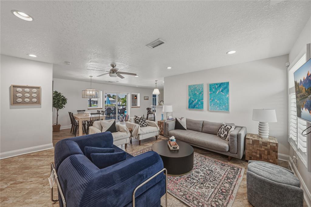 1004 Sago Palm Way Apollo Beach, FL 33572 - Photo 8 of 92 a living room with furniture a rug and a window