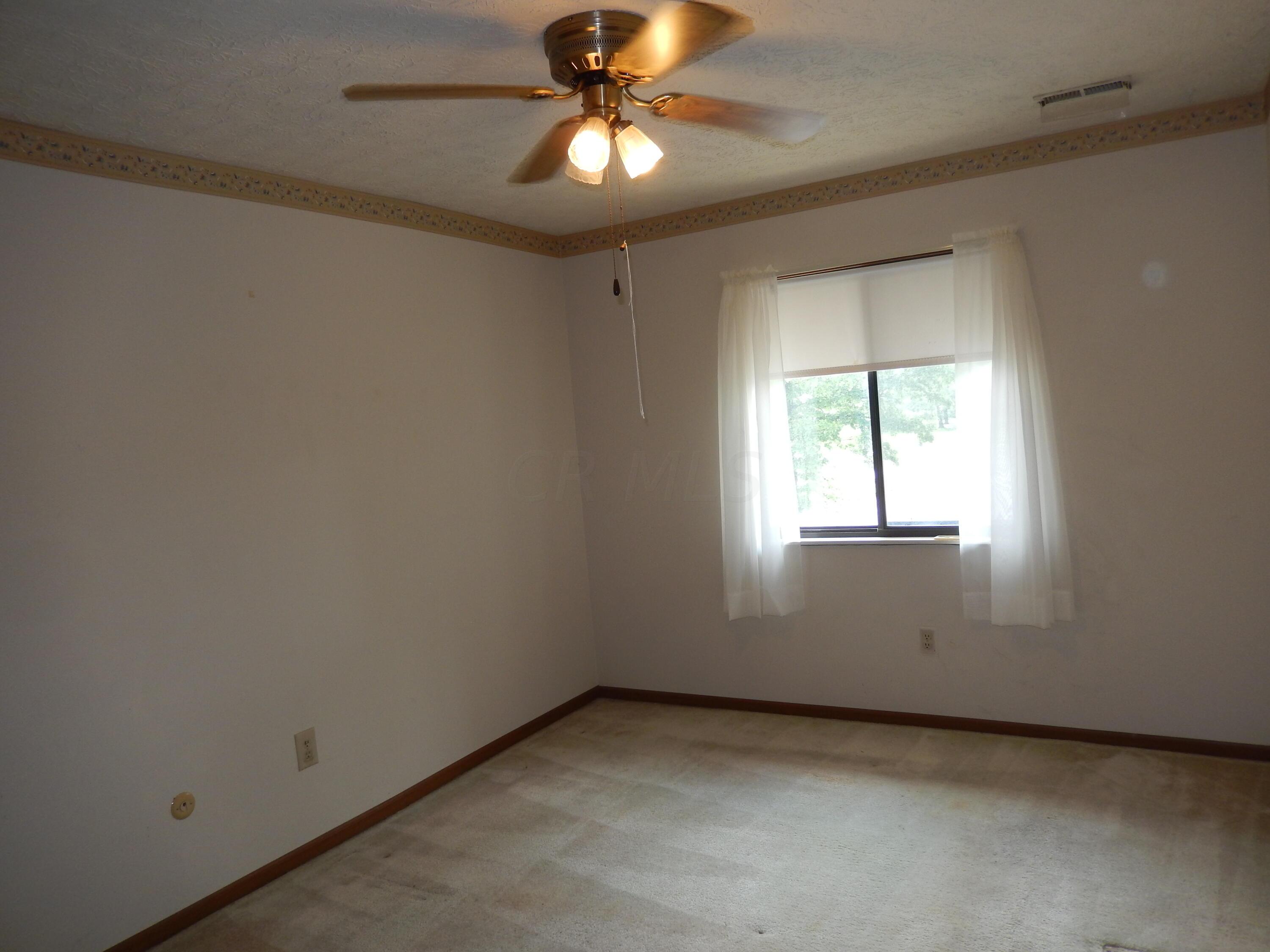 4119 Karl Road, Unit 309 Columbus, OH 43224 - Photo 23 of 26 Bedroom #2 with ceiling fan