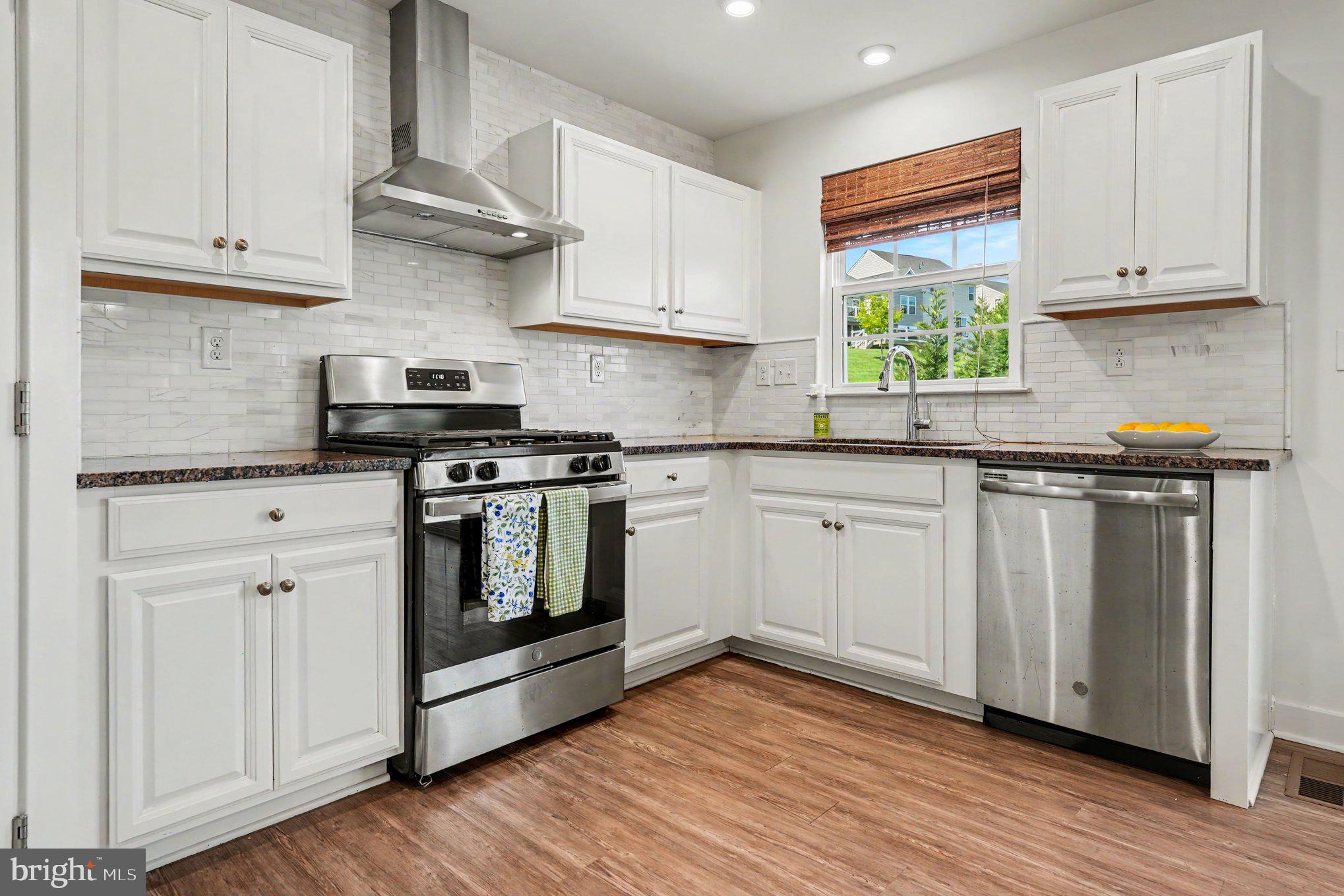 165 Pixie Moss Road Pottstown, PA 19464 - Photo 18 of 37 Modern kitchen with sleek finishes.