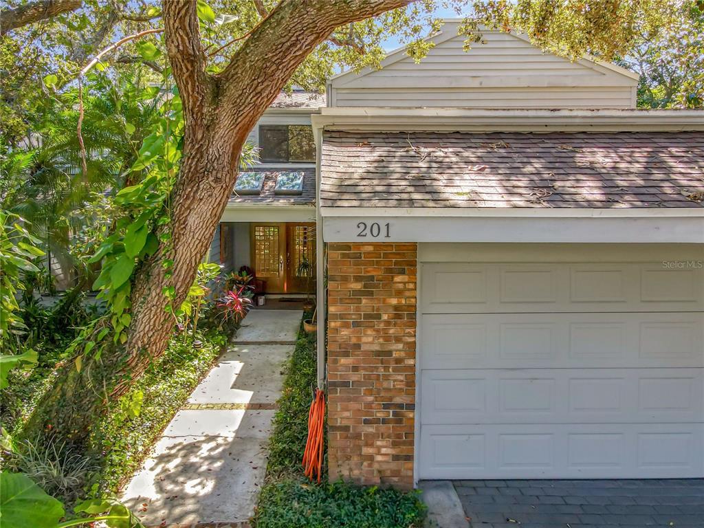 201 Pine Cone Lane Longwood, FL 32779 - Photo 1 of 82 a front view of a house with a yard