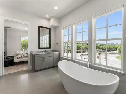 a view of a patio with dining table and chairs