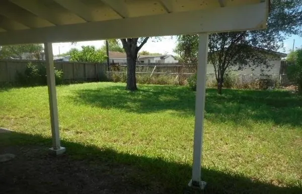 a view of backyard with green space