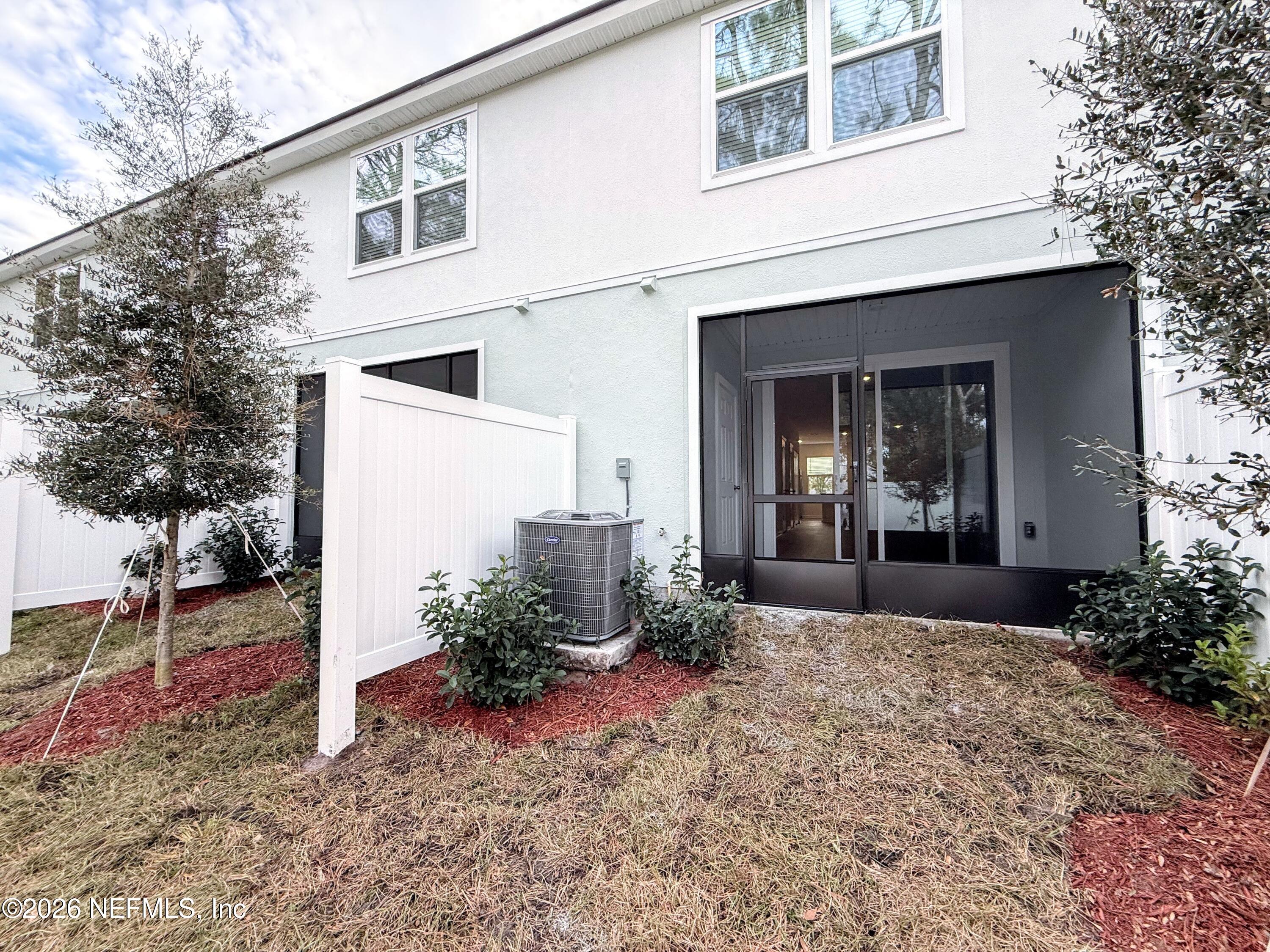 131 Palmetto Rdg Road St. Augustine, FL 32095 - Photo 17 of 20 a view of a house with backyard and garden