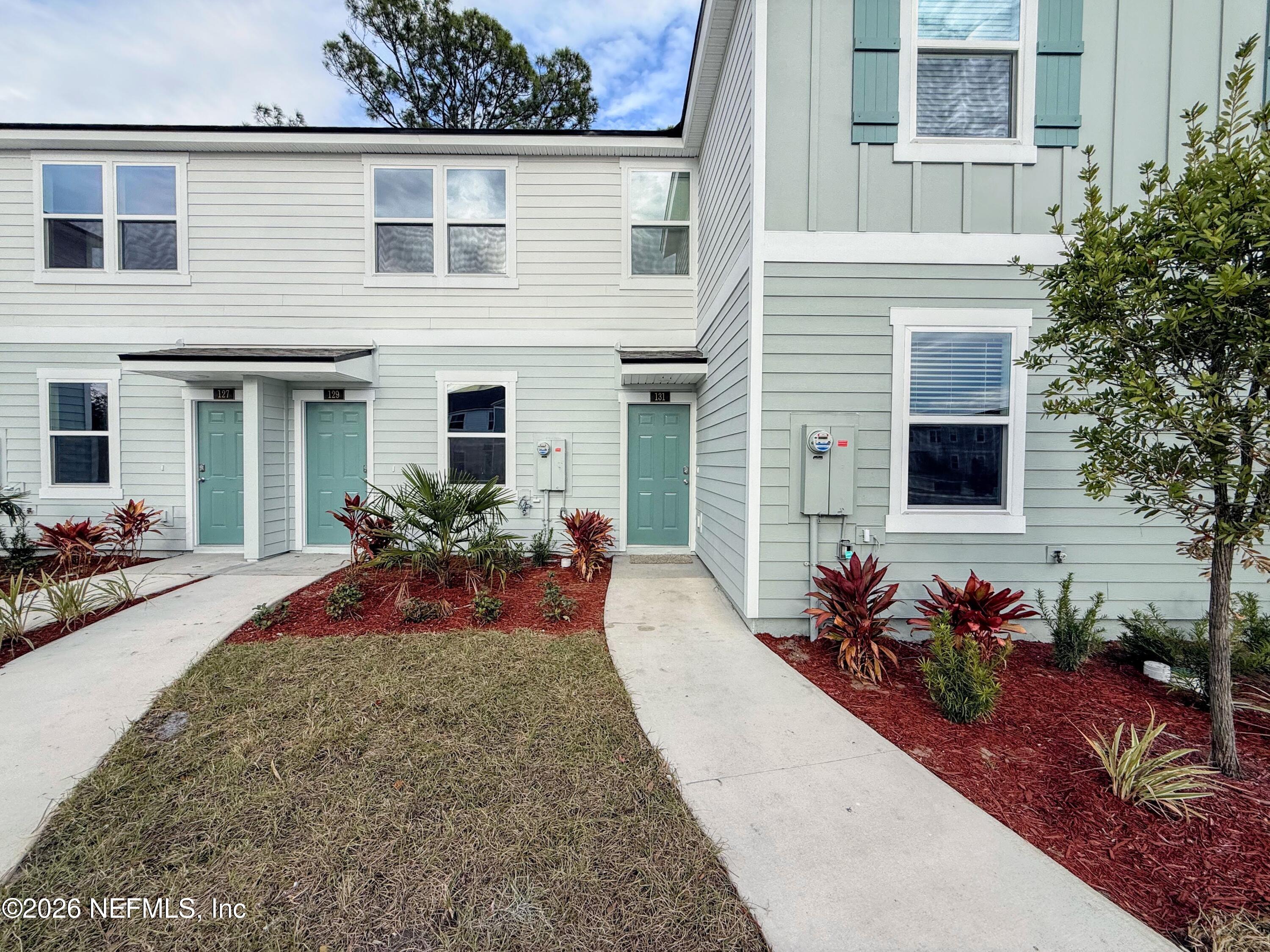 131 Palmetto Rdg Road St. Augustine, FL 32095 - Photo 2 of 22 a view of a house with patio