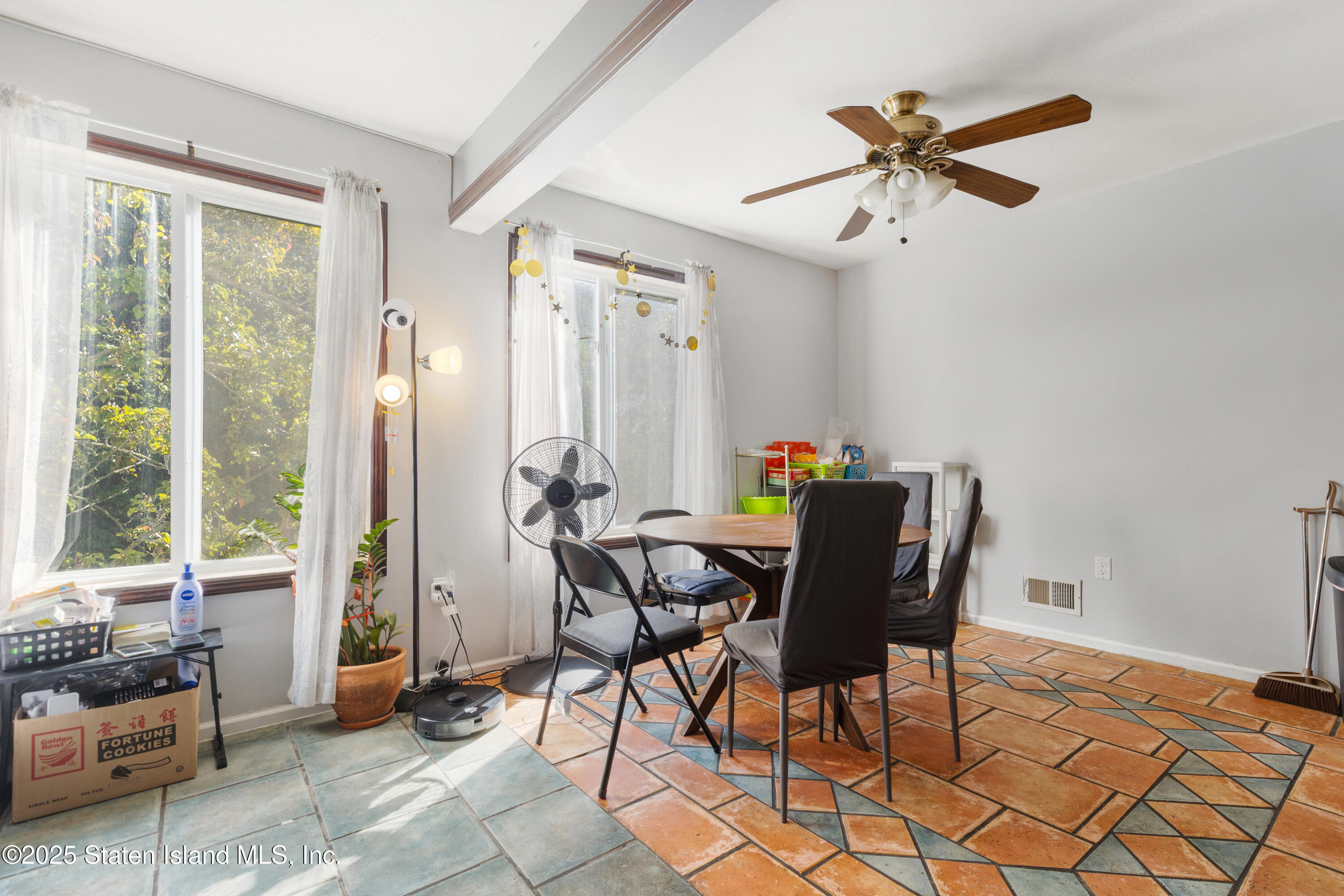263 Jamie Lane Staten Island, NY 10312 - Photo 17 of 44 a view of a livingroom with furniture and a window
