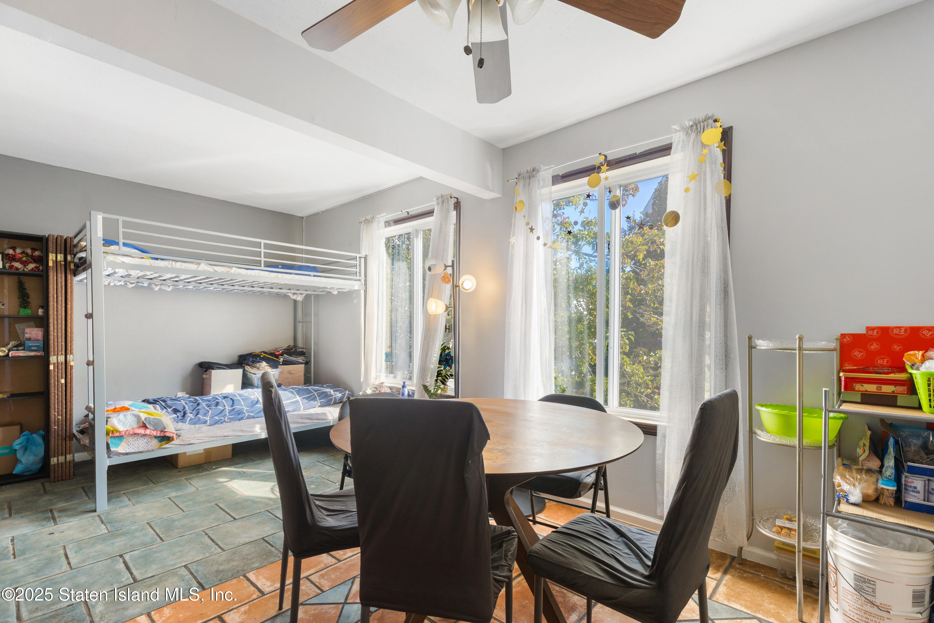 263 Jamie Lane Staten Island, NY 10312 - Photo 18 of 44 a view of a workspace with furniture and a window