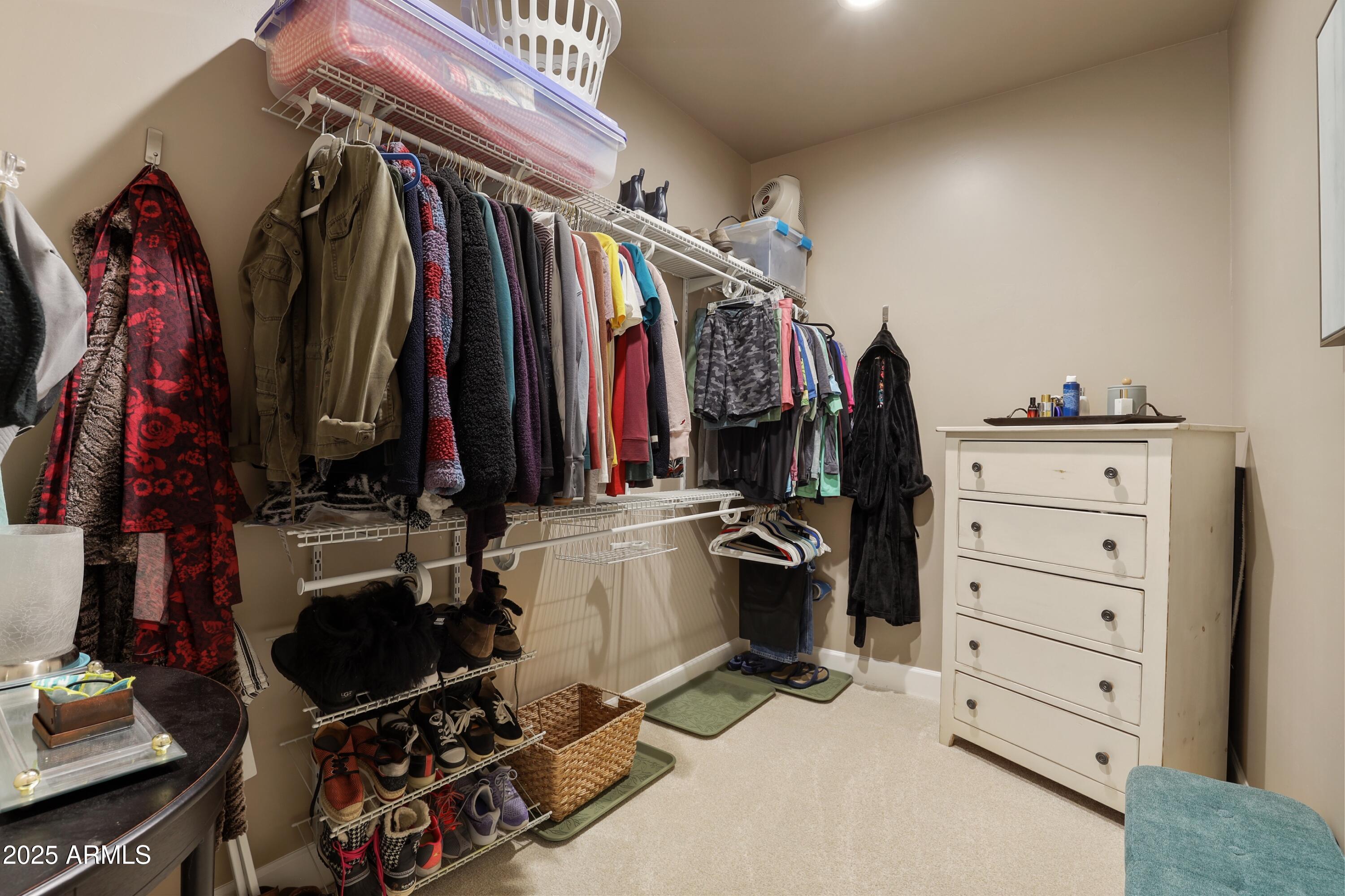 506 North Eagle Ridge Road Payson, AZ 85541 - Photo 18 of 41 a view of walk in closet with clothes and shoes
