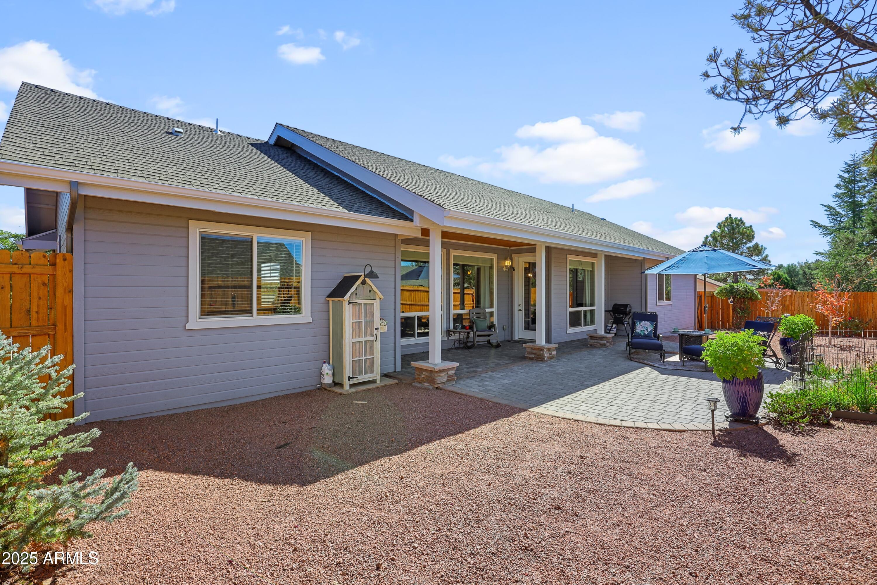 506 North Eagle Ridge Road Payson, AZ 85541 - Photo 31 of 41 a front view of a house with a yard and outdoor seating
