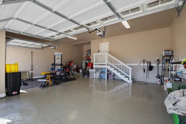 a view of a garage with a table and chairs