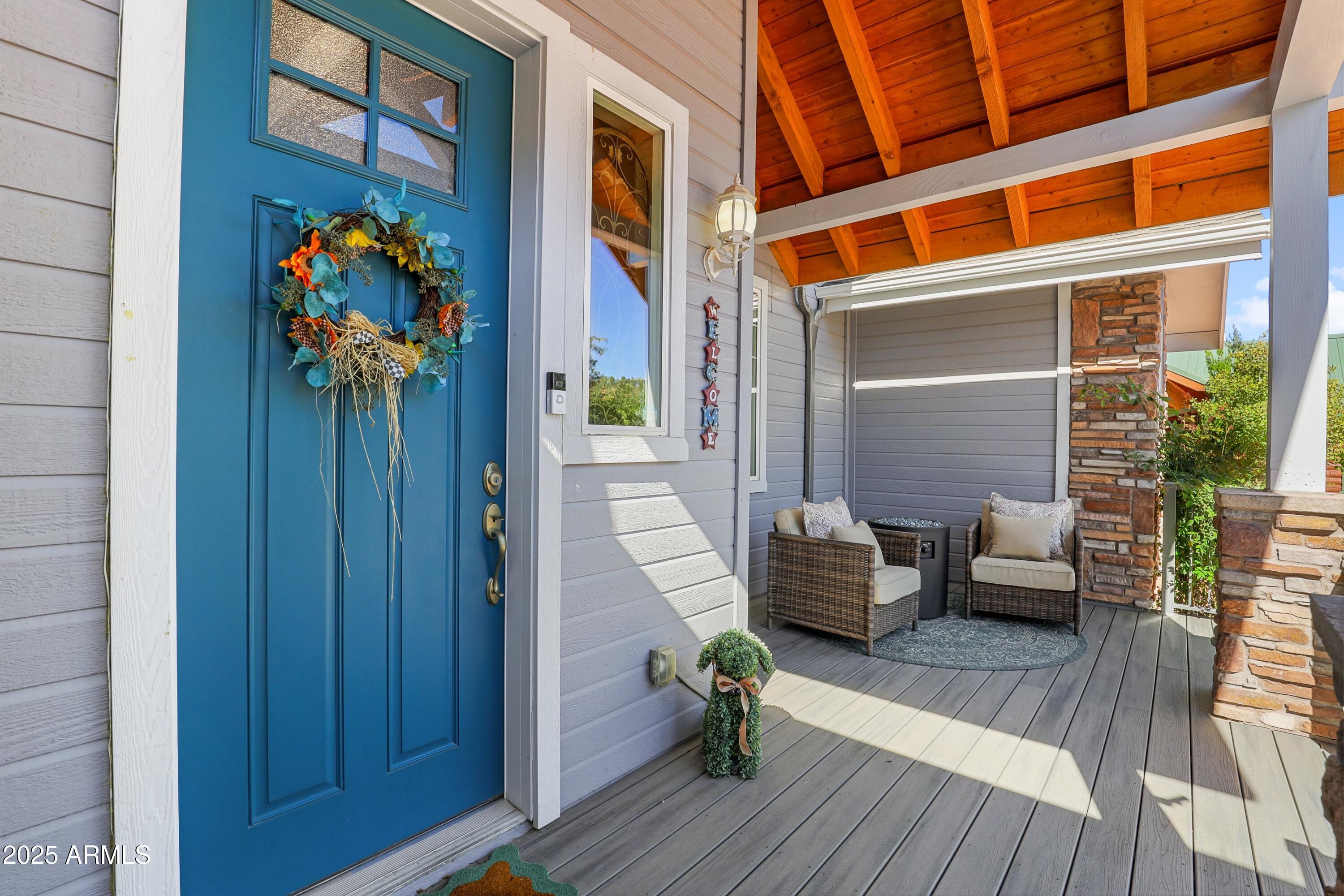 506 North Eagle Ridge Road Payson, AZ 85541 - Photo 38 of 41 a balcony with couch and wooden floor