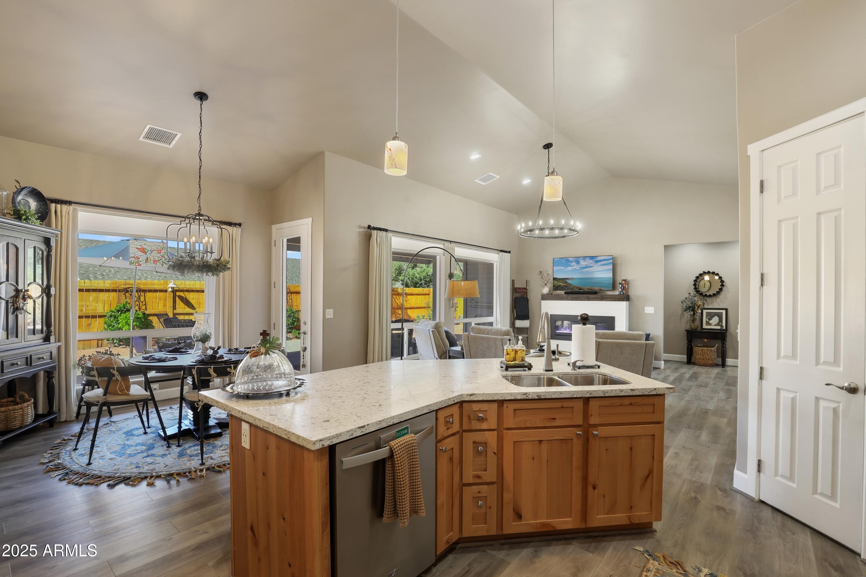 506 North Eagle Ridge Road Payson, AZ 85541 - Photo 10 of 41 a kitchen with sink stove and living room