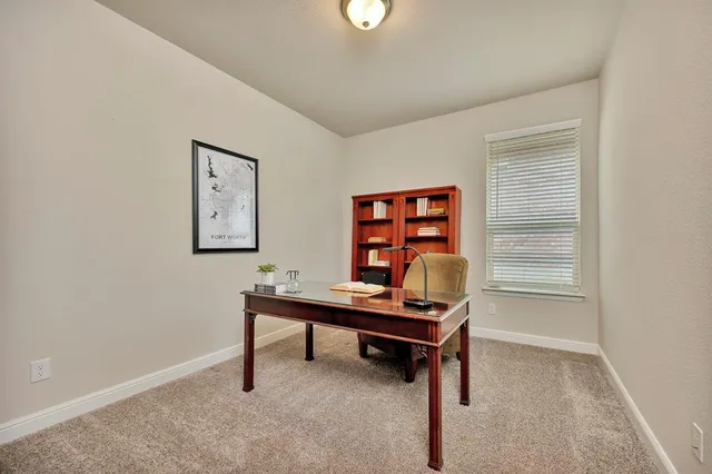 a room with a table and a workspace