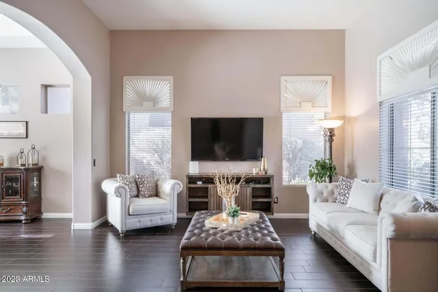 a living room with furniture or couch and a flat screen tv