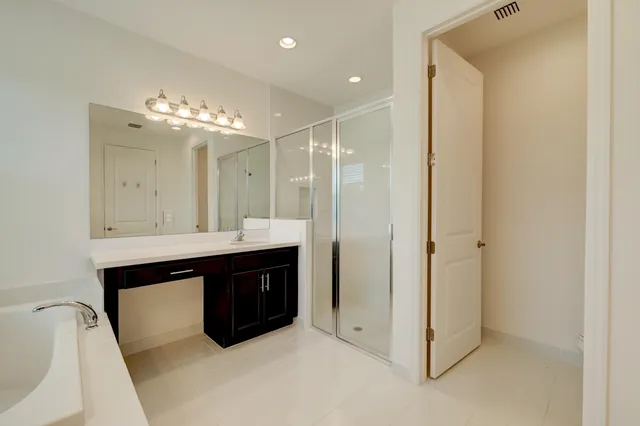 a view of a lake with a building in the background