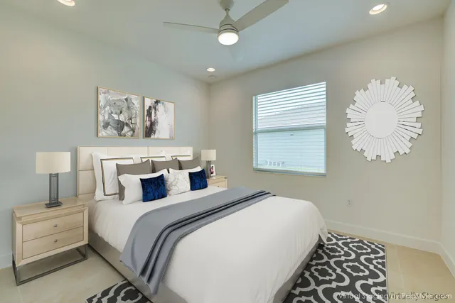 a view of a house with a big yard and sitting area