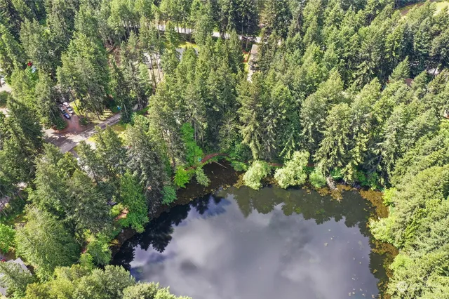 a view of a garden from a balcony