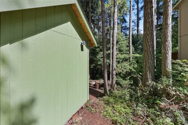 a backyard of a house with lots of green space