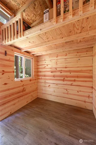 a view of a terrace area with wooden floor