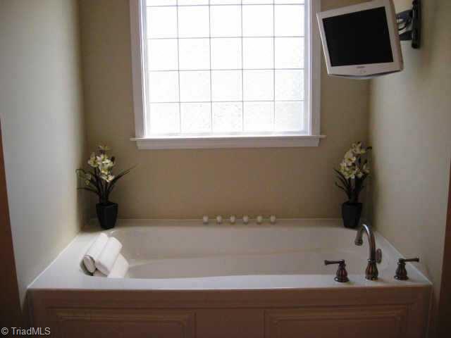 571 Barnsdale Ridge Road Kernersville, NC 27284 - Photo 8 of 9 Other. Check out the flat screen swivel mounted above the soaking tub!