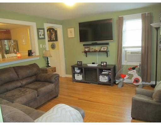 18 Arnold Road Sturbridge, MA 01518 - Photo 4 of 22 a living room with furniture and a flat screen tv