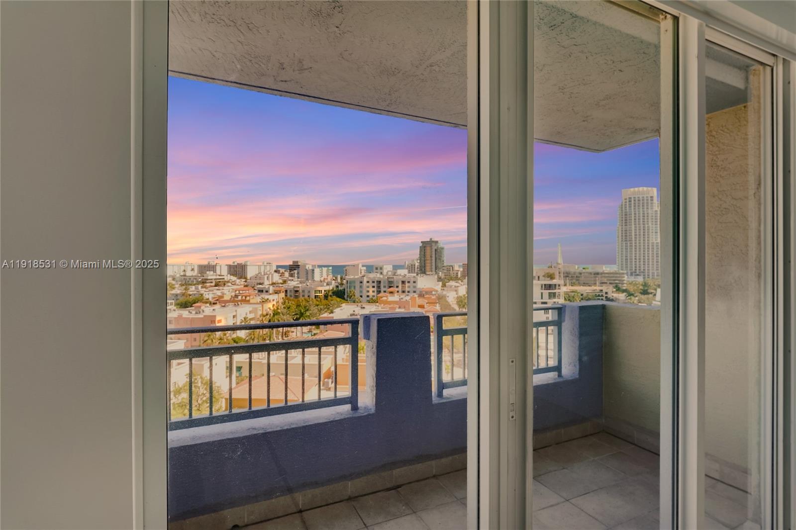 90 Alton Road, Unit 1209 Miami Beach, FL 33139 - Photo 21 of 44 a view of a glass door and a balcony