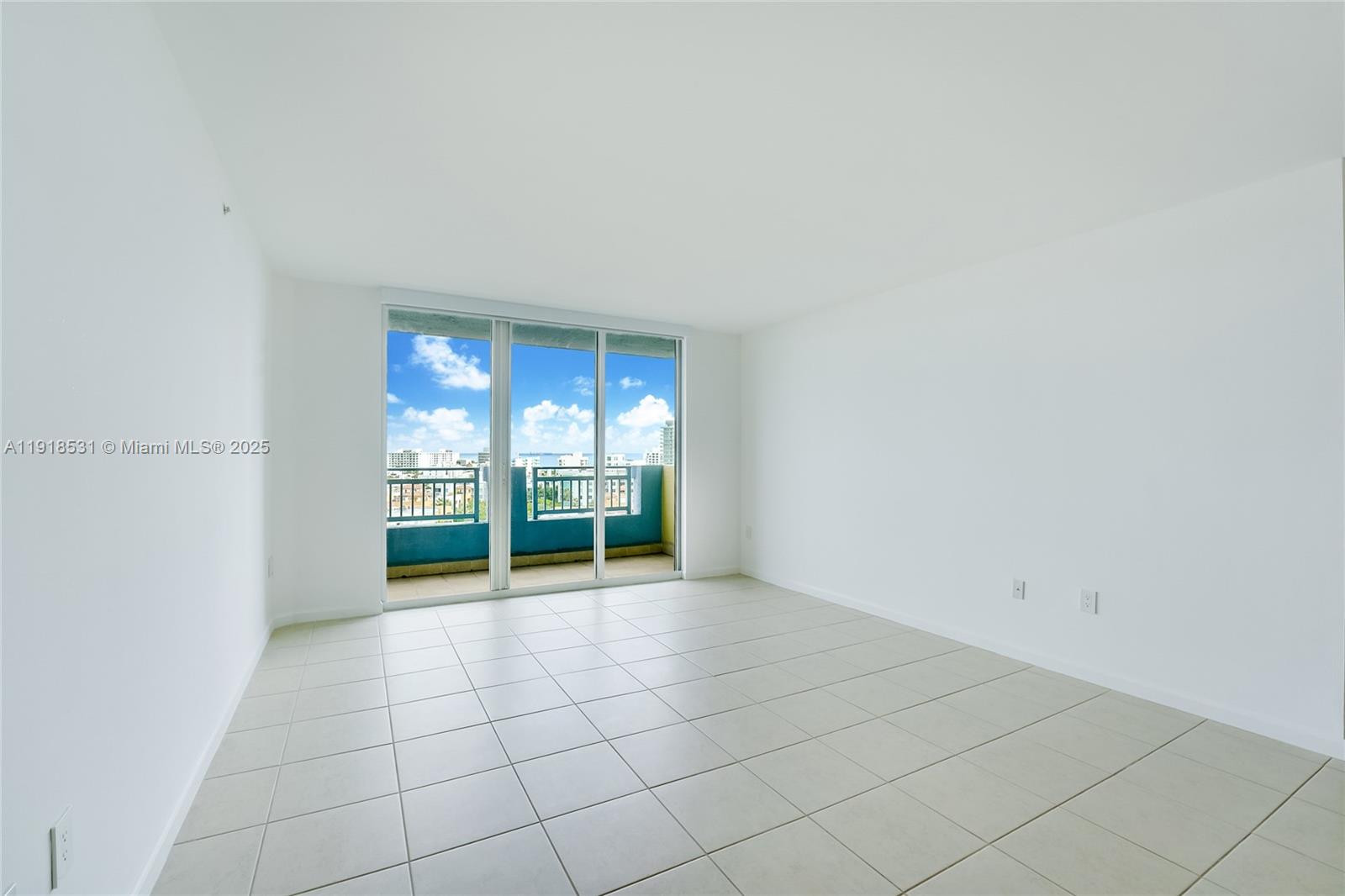 90 Alton Road, Unit 1209 Miami Beach, FL 33139 - Photo 24 of 44 a view of an empty room with a window