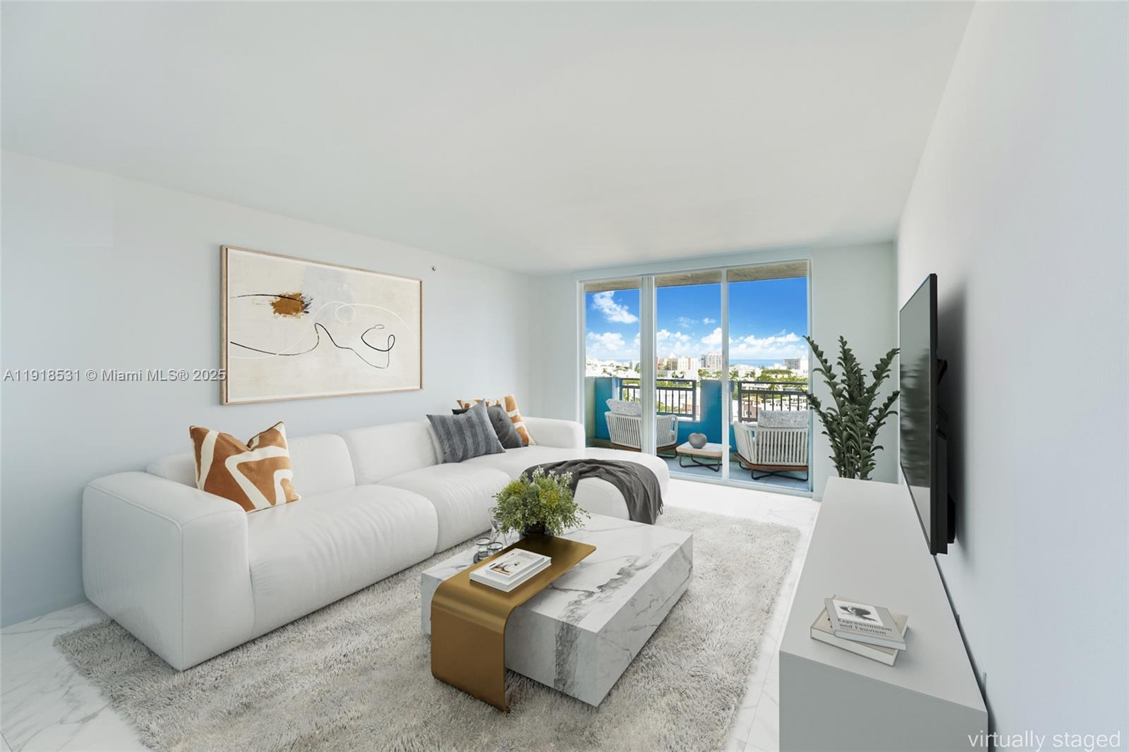 90 Alton Road, Unit 1209 Miami Beach, FL 33139 - Photo 25 of 44 a living room with furniture a rug and a potted plant