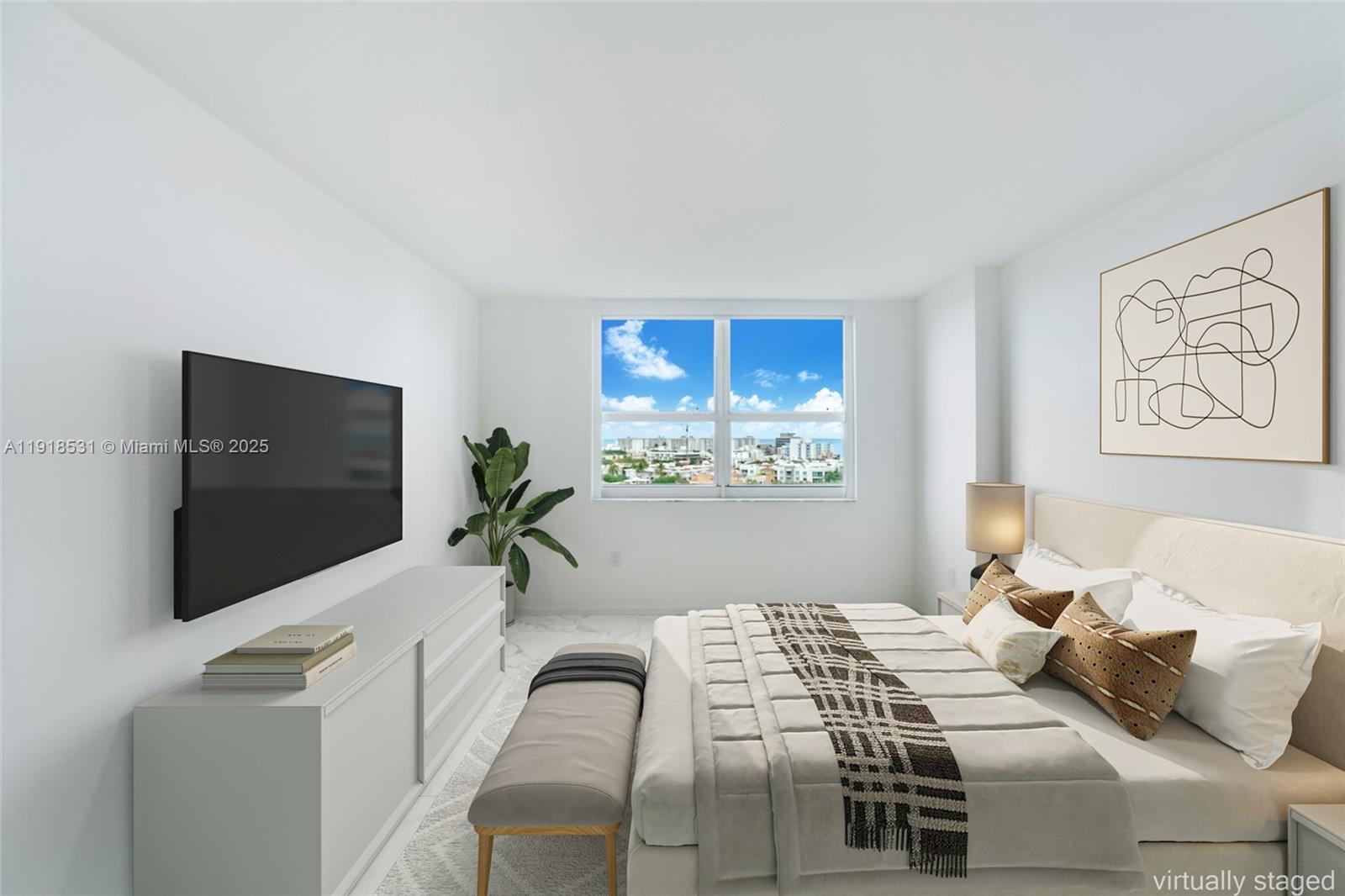 90 Alton Road, Unit 1209 Miami Beach, FL 33139 - Photo 33 of 44 a bedroom with a bed and a flat screen tv