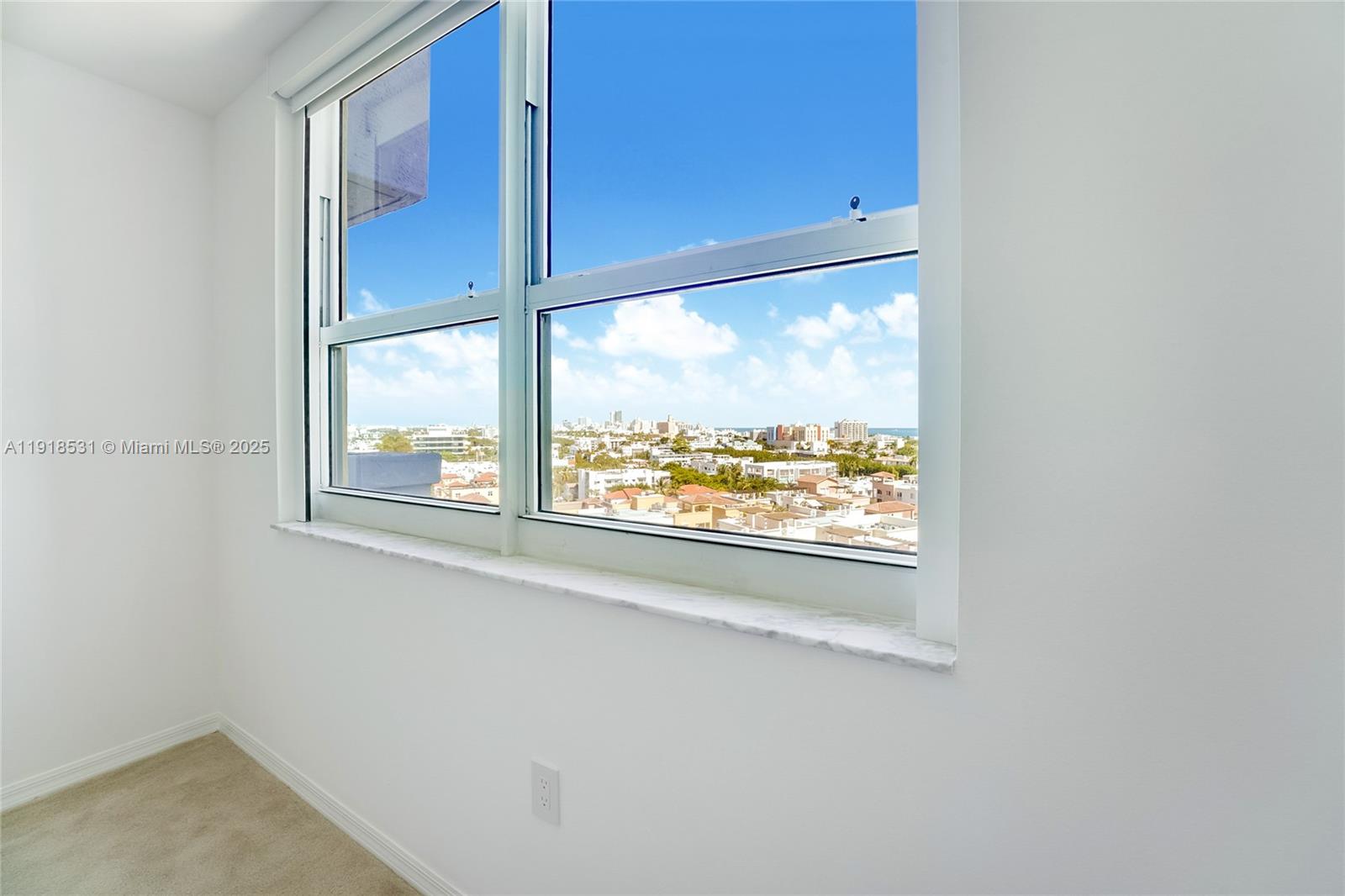 90 Alton Road, Unit 1209 Miami Beach, FL 33139 - Photo 41 of 44 a view of a window in a room
