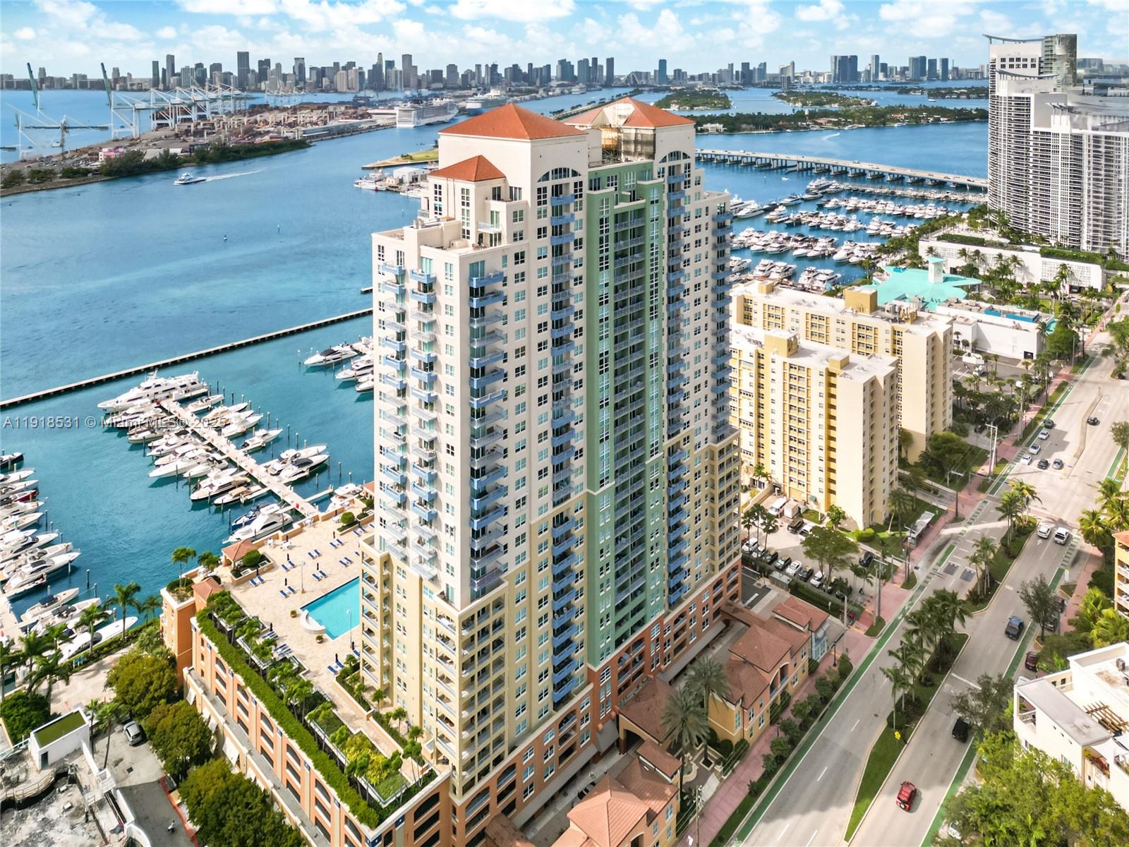 90 Alton Road, Unit 1209 Miami Beach, FL 33139 - Photo 5 of 44 a view of a city with a lake
