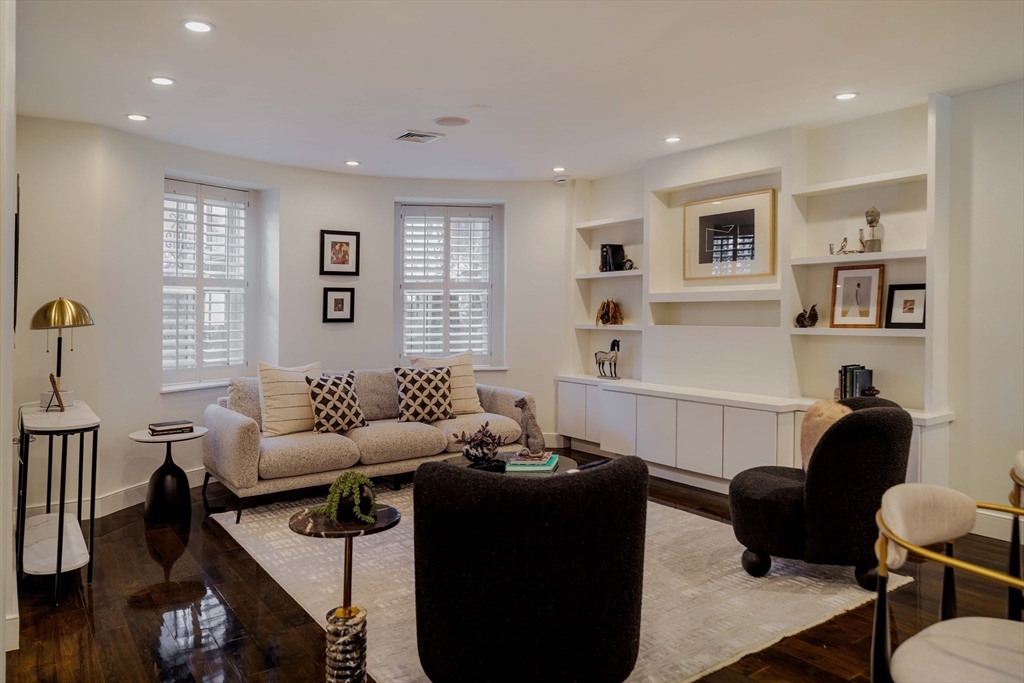 92 Waltham Street, Unit 1A Boston, MA 02118 - Photo 12 of 41 a living room with furniture and windows