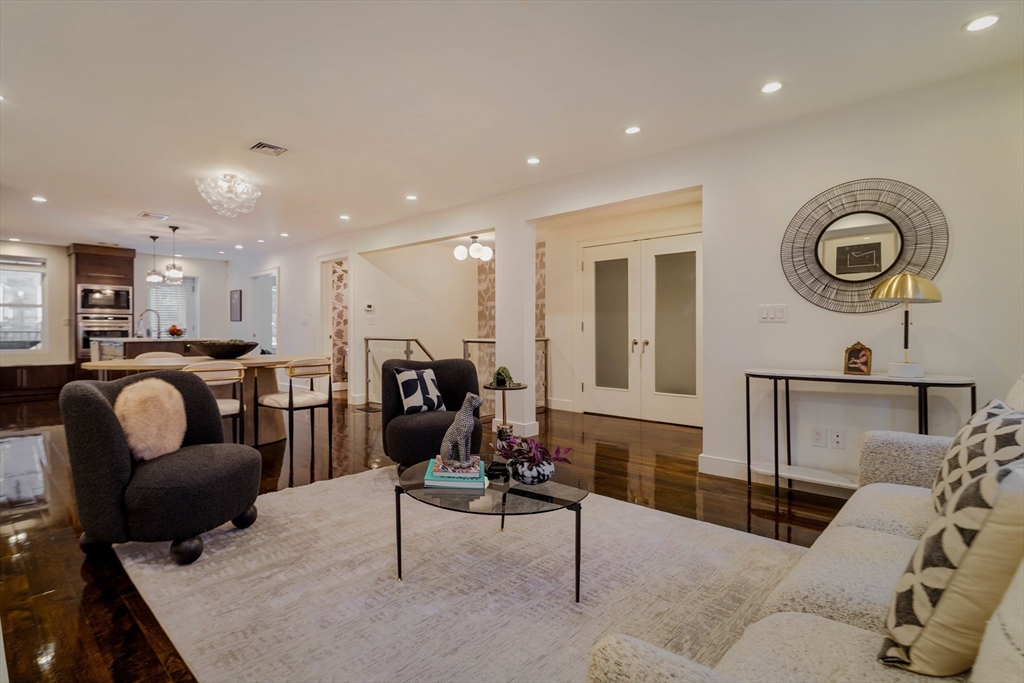 92 Waltham Street, Unit 1A Boston, MA 02118 - Photo 15 of 41 a living room with furniture and a view of kitchen