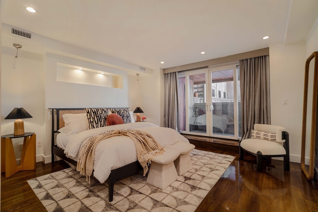 92 Waltham Street, Unit 1A Boston, MA 02118 - Photo 19 of 41 a bedroom with a bed and a window