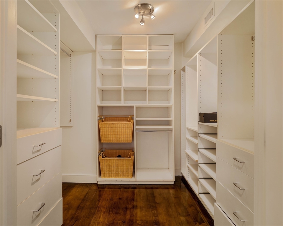 92 Waltham Street, Unit 1A Boston, MA 02118 - Photo 22 of 41 a view of walk in closet with empty racks