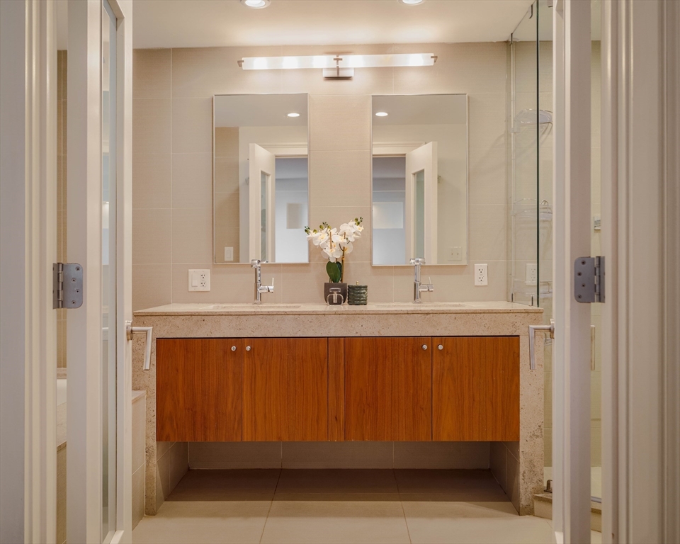 92 Waltham Street, Unit 1A Boston, MA 02118 - Photo 23 of 41 a bathroom with a sink and a mirror