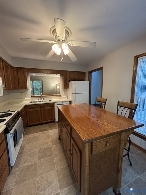 14604 Mill Spring Drive Midlothian, VA 23112 - Photo 5 of 28 Kitchen featuring wood-finish cabinetry, light-ton