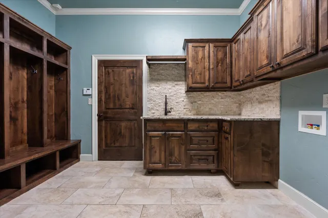 a view of an empty room with a fireplace