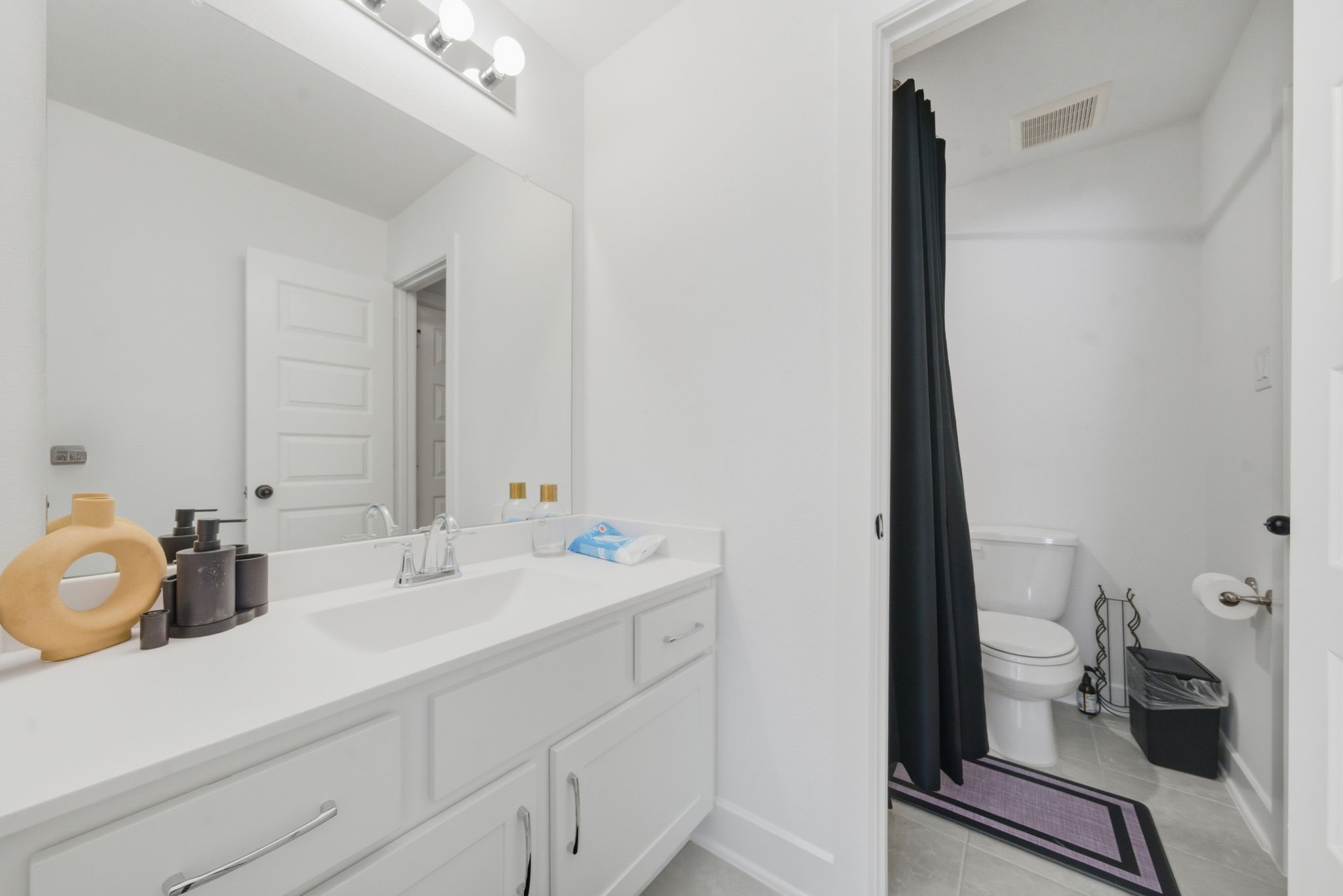 10438 Rigel Rdg Way Richmond, TX 77406 - Photo 30 of 34 a bathroom with a sink and a toilet
