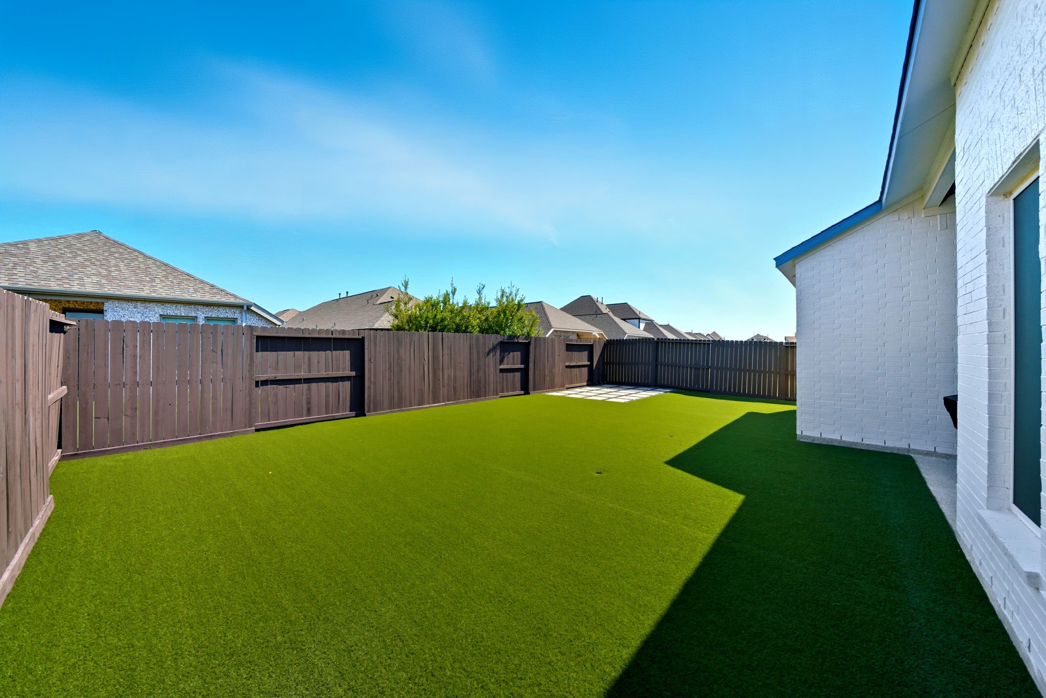 10438 Rigel Rdg Way Richmond, TX 77406 - Photo 34 of 34 a view of a backyard with a cabin