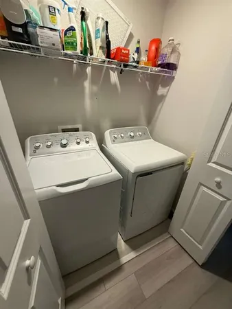 a view of a room with air conditioner duct and materials on floor