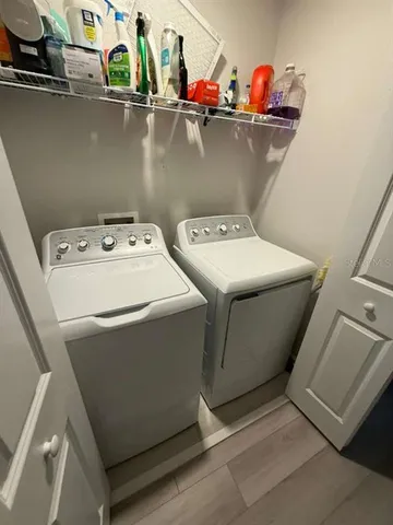 a view of a room with air conditioner duct and materials on floor