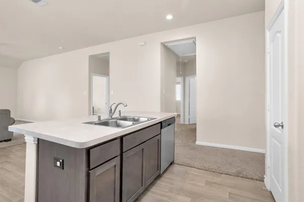 an empty room with closet area