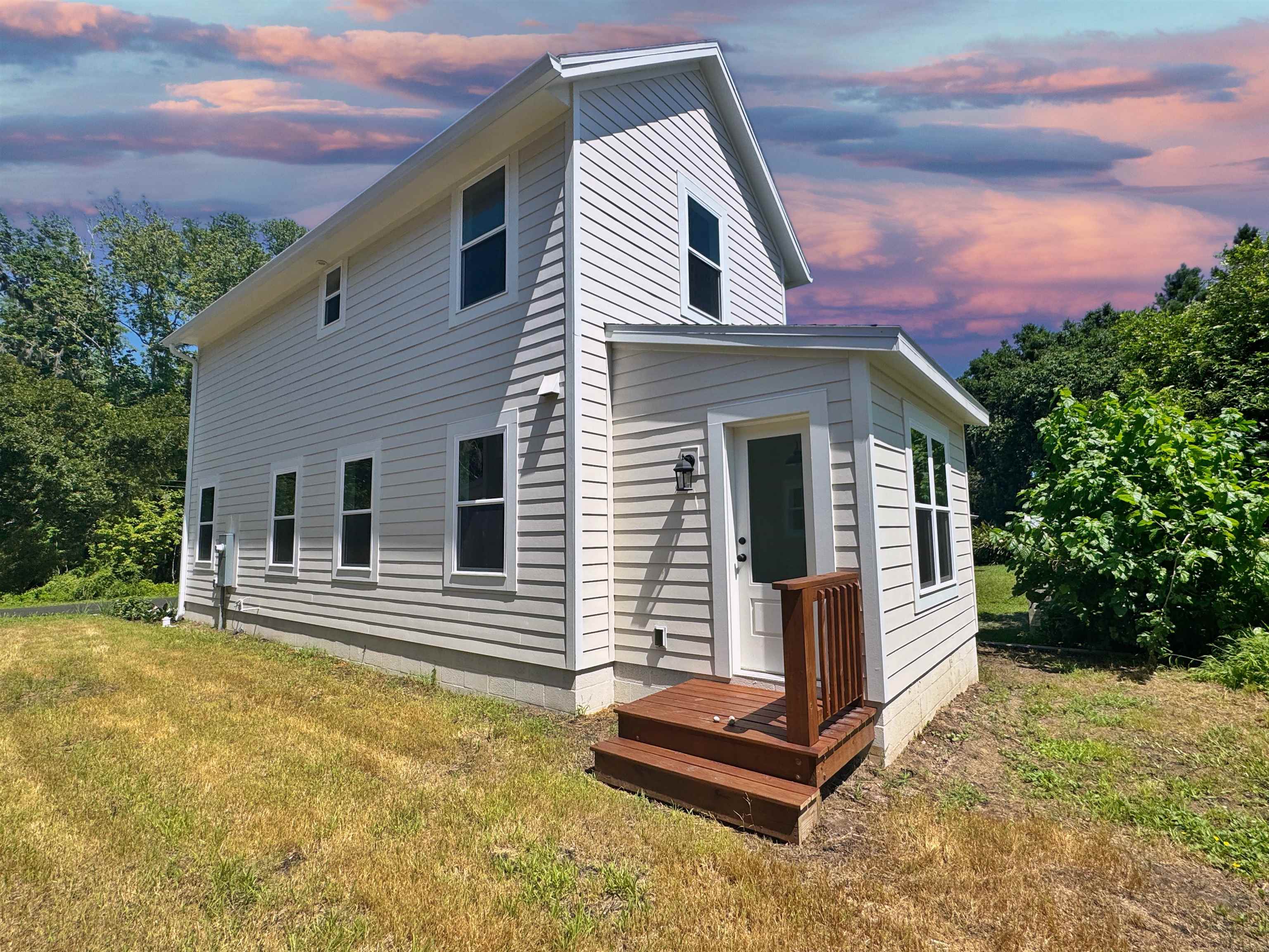 932 Alexander Street St. Augustine, FL 32084 - Photo 28 of 28 a front view of a house with a yard