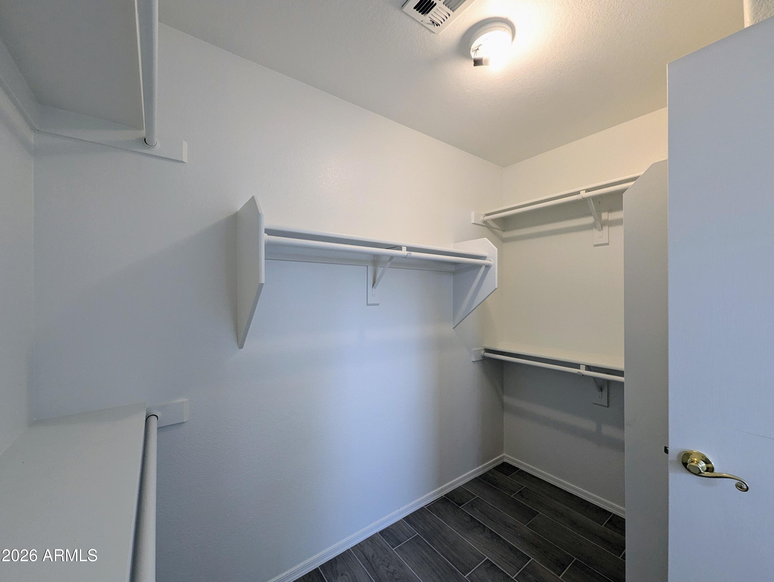 5424 West Wagoner Road Glendale, AZ 85308 - Photo 23 of 37 a view of an empty walk in closet