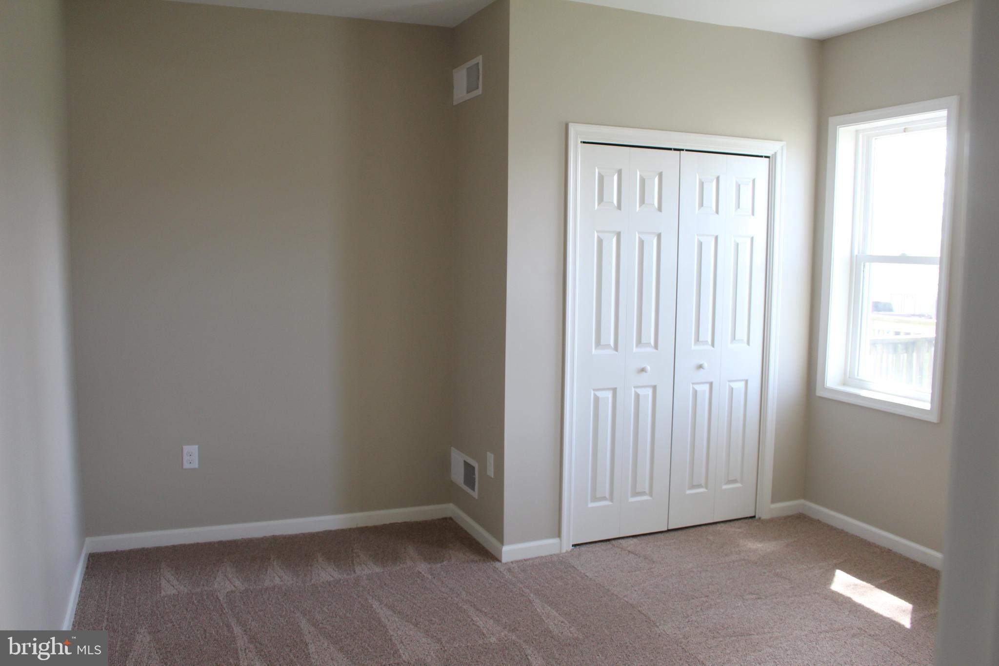 2560 Freysville Road, Unit B Red Lion, PA 17356 - Photo 5 of 6 an empty room with windows