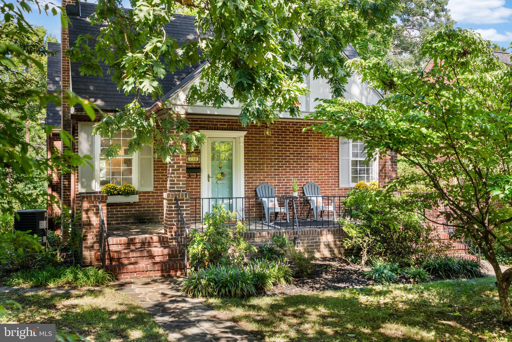 710 Anneslie Road Baltimore, MD 21212 - Photo 1 of 56 Charming brick home nestled in lush greenery.